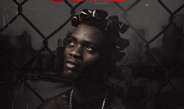 YS.manrasta posing with OSAS cover artwork