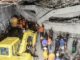 Rescue workers and police search through concrete rubble at the collapsed Al-Khoziny Islamic Boarding School in Sidoarjo, East Java, Indonesia.